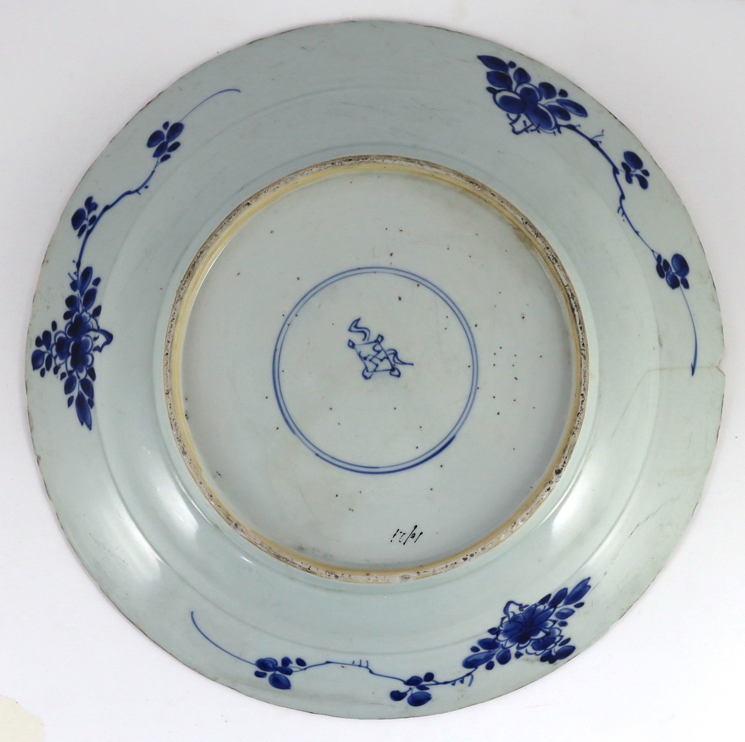 A Chinese blue and white panelled dish, Kangxi period, 36.5cm diameter, rim chip with hairline crack